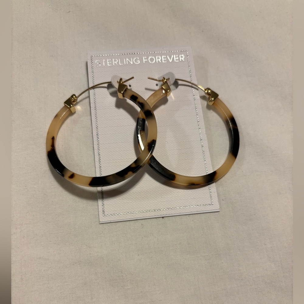 Tortoise hoops with gold over sterling hoops. Just under 2”